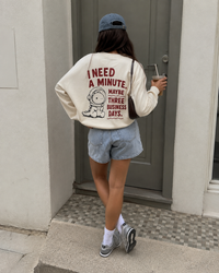 I need a minute beige sweatshirt