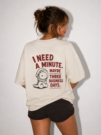 I need a minute beige oversize tee